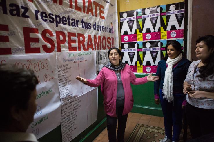 Woman leading a workshop in LAC