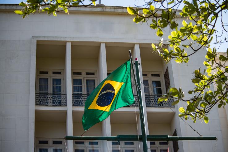 Brazilian flag in front of a government building