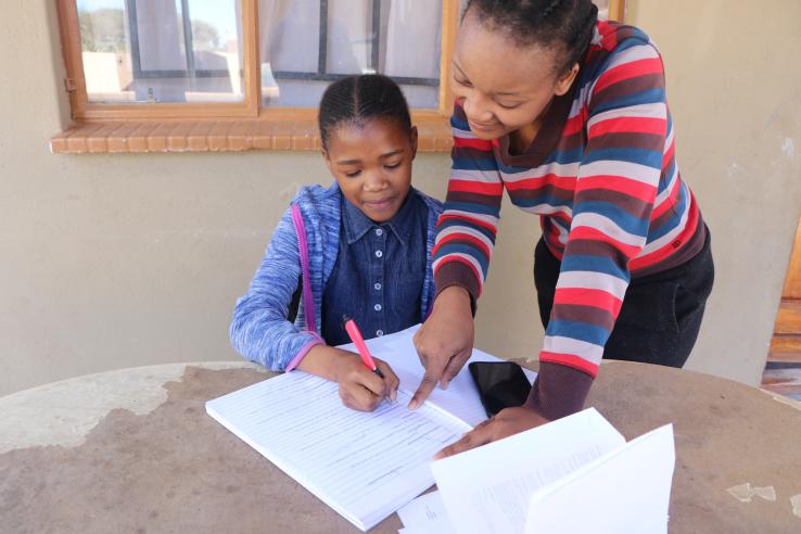 Tutor and student study together in Gaborone