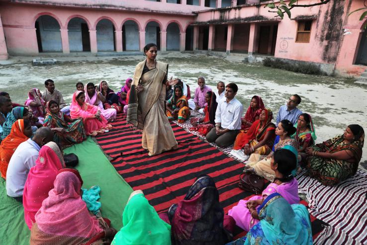 Image of Elected Women Representatives gathering in a circle in Bihar, India.