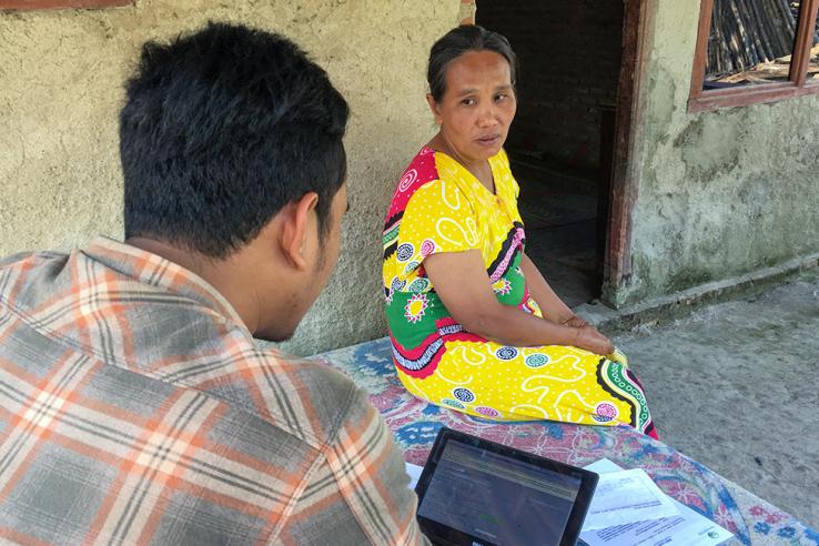 Interviewing respondents for an evaluation in Indonesia