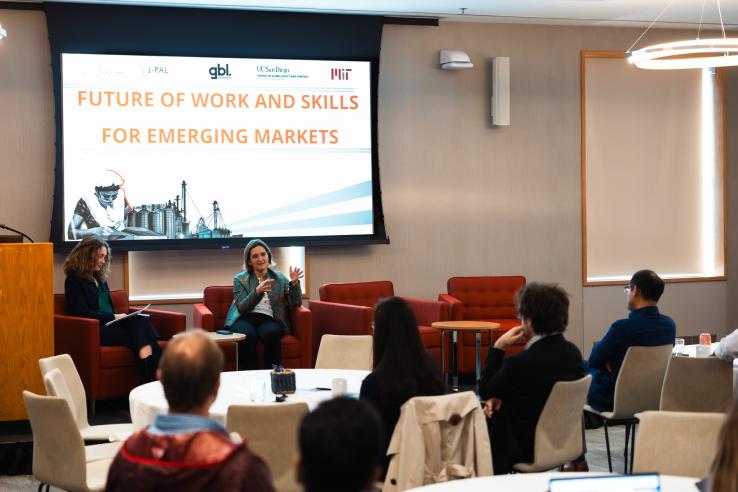 Esther Duflo, J-PAL co-founder and director and professor at MIT, with Julie Cobill, ESG and corporate partnerships lead at J-PAL, during the keynote dialogue session.