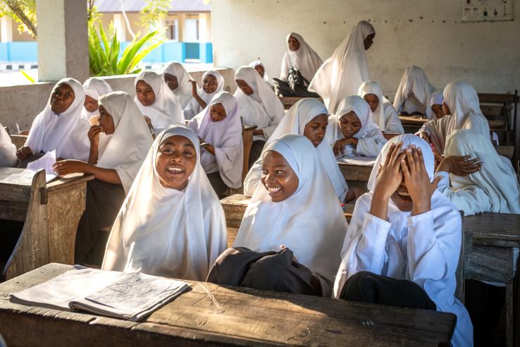 Female students wearing headscarves are seated in an English classroom at Jambiani Secondary School in Jambiani, Zanzibar, Tanzania.