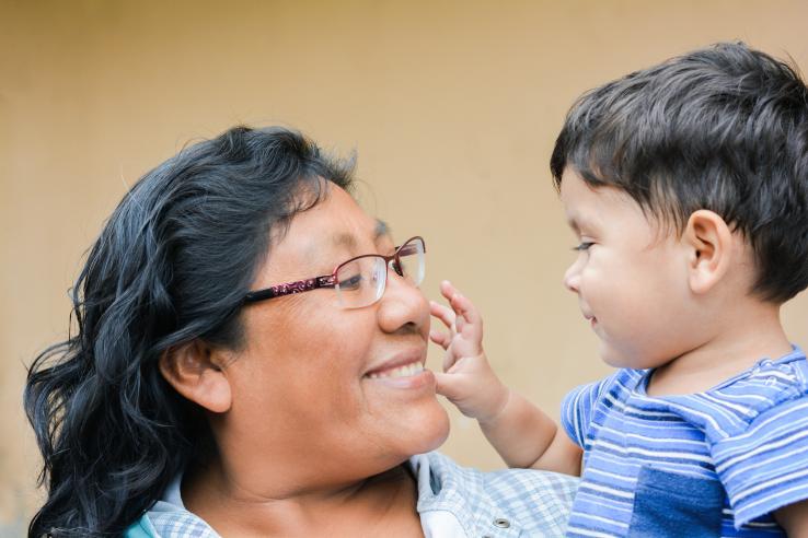 Mother and child smiling 