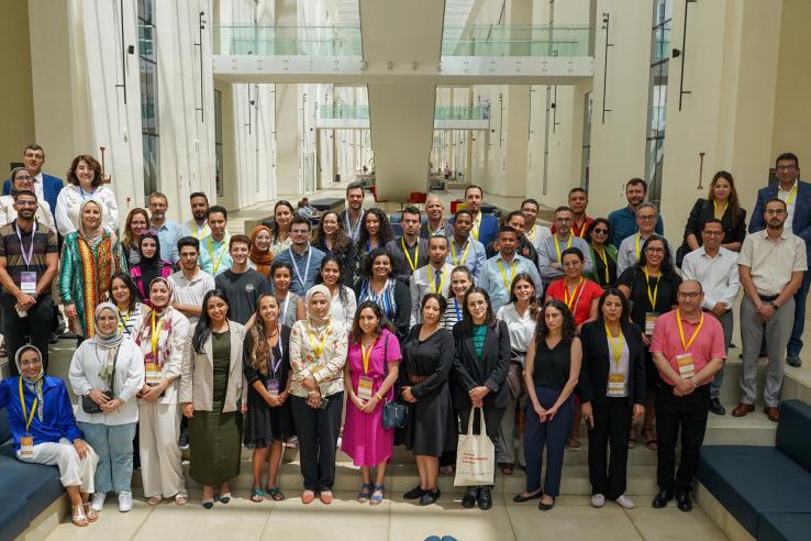 A group photo of around 45 training participants, organisers and teaching staff.