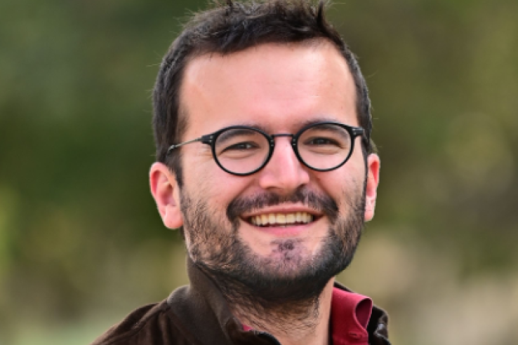 A headshot of a man