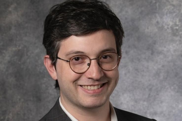 A headshot of a man