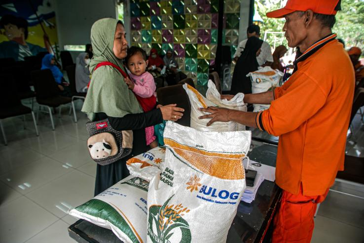 A person getting supplies