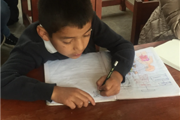 Child studying in a rural school in Quelucas and Santa Cruz, Amazonas, Perú