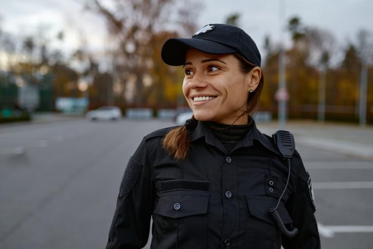Image of a female police officer smiling.