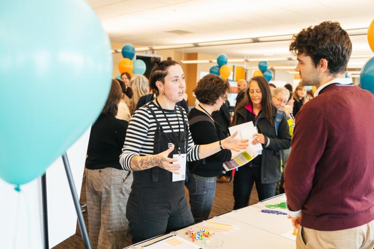 Two people talking to each other in the convening