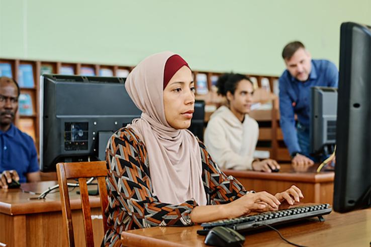 Woman uses a computer