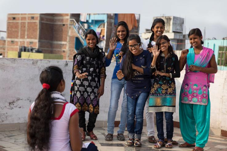 Young women take a group photo