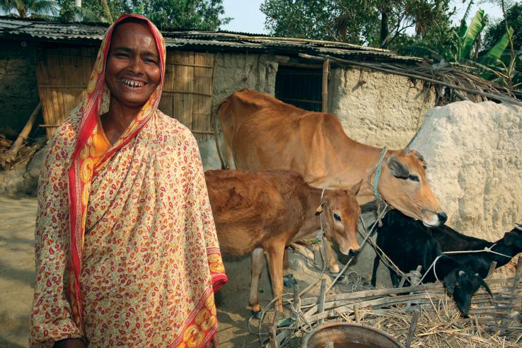 Beneficiary of Graduation in Bangladesh with her livestock