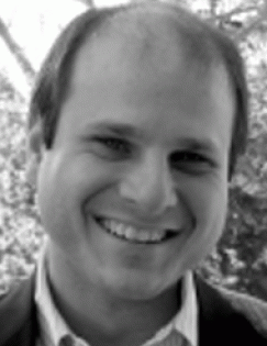 Headshot of Dean Karlan