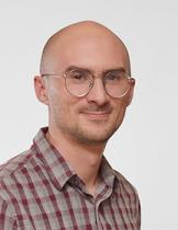 headshot of Mauricio Romero