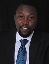Headshot of Olukolade George Shobo