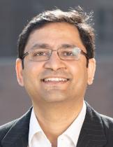 headshot of Tarun Jain wearing a white shirt