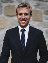 Headshot of Nichloas