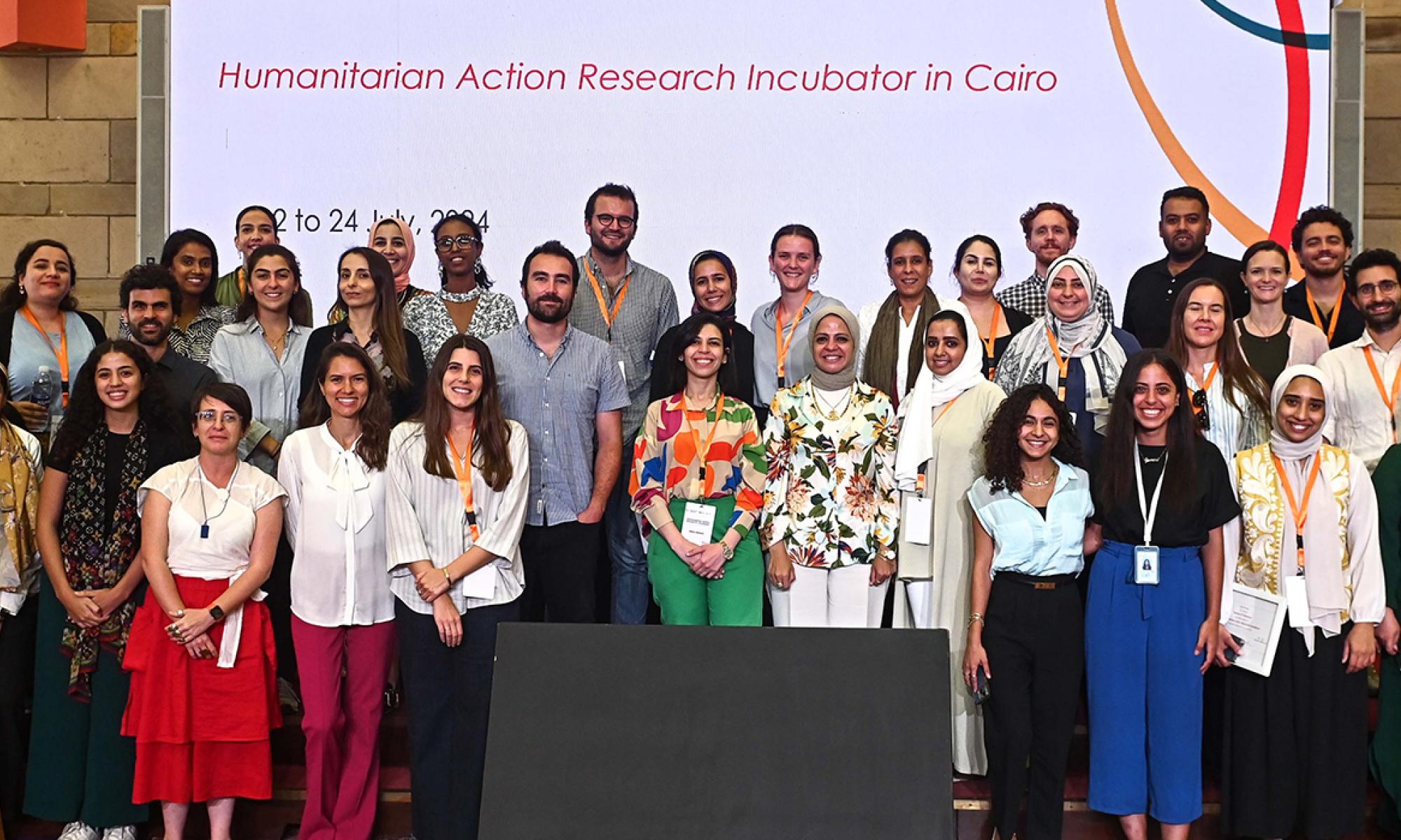 Group photo of J-PAL staff during an event in Cairo