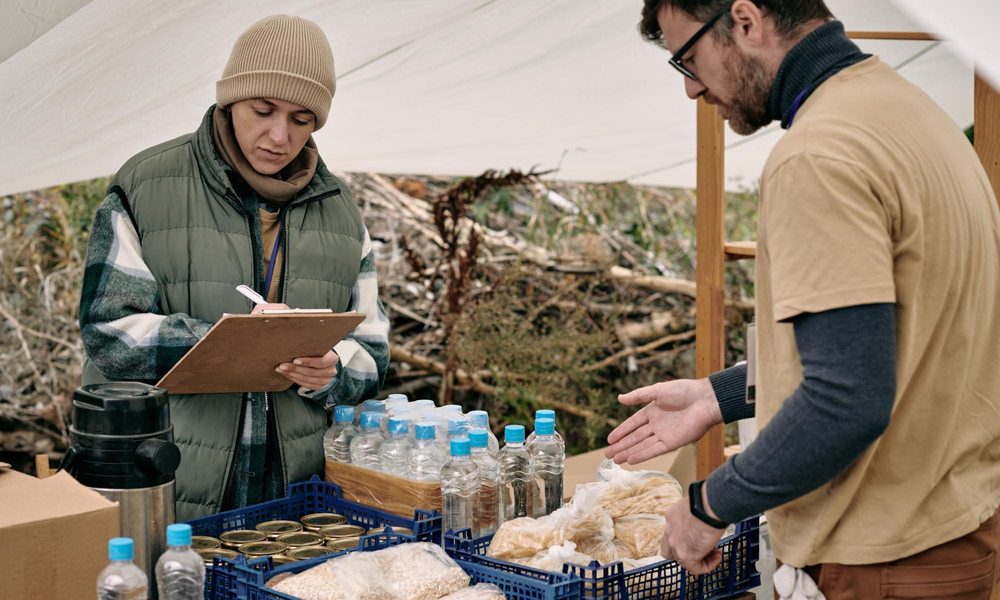 Volunteers set up water distribution