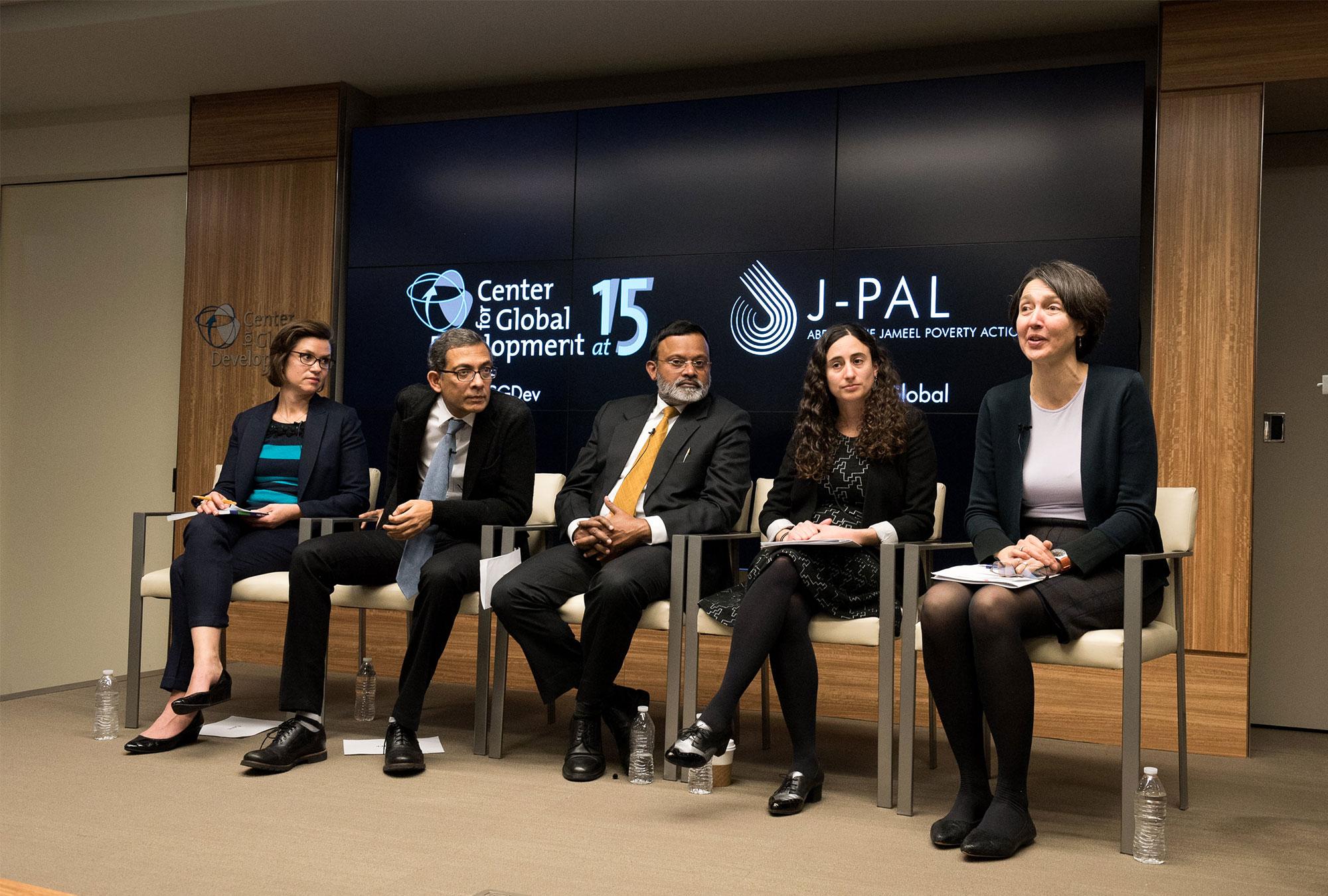 Panel of five speakers at the event