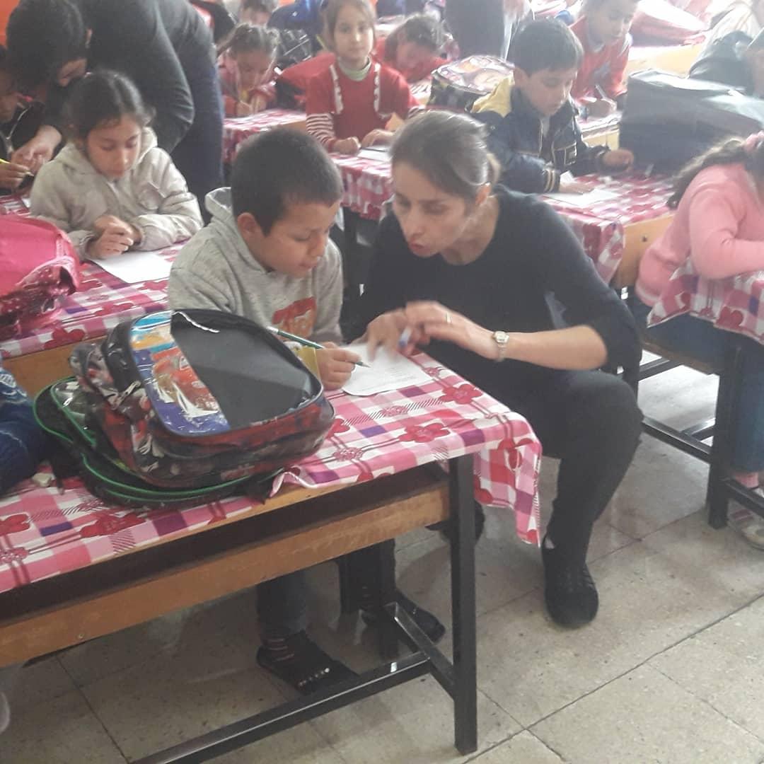 Sule Alan talks to children in a classroom in Turkey. 