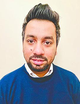 Headshot of Qaiser Raza