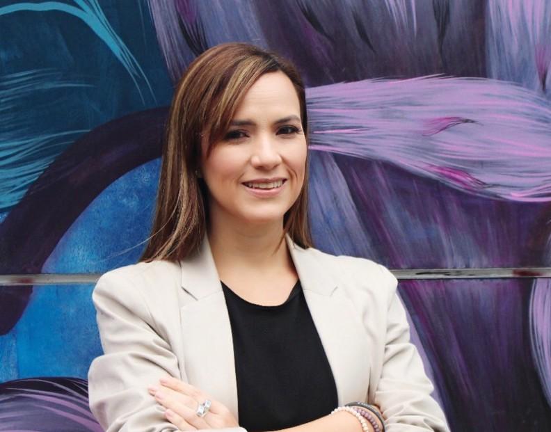 A headshot of a woman