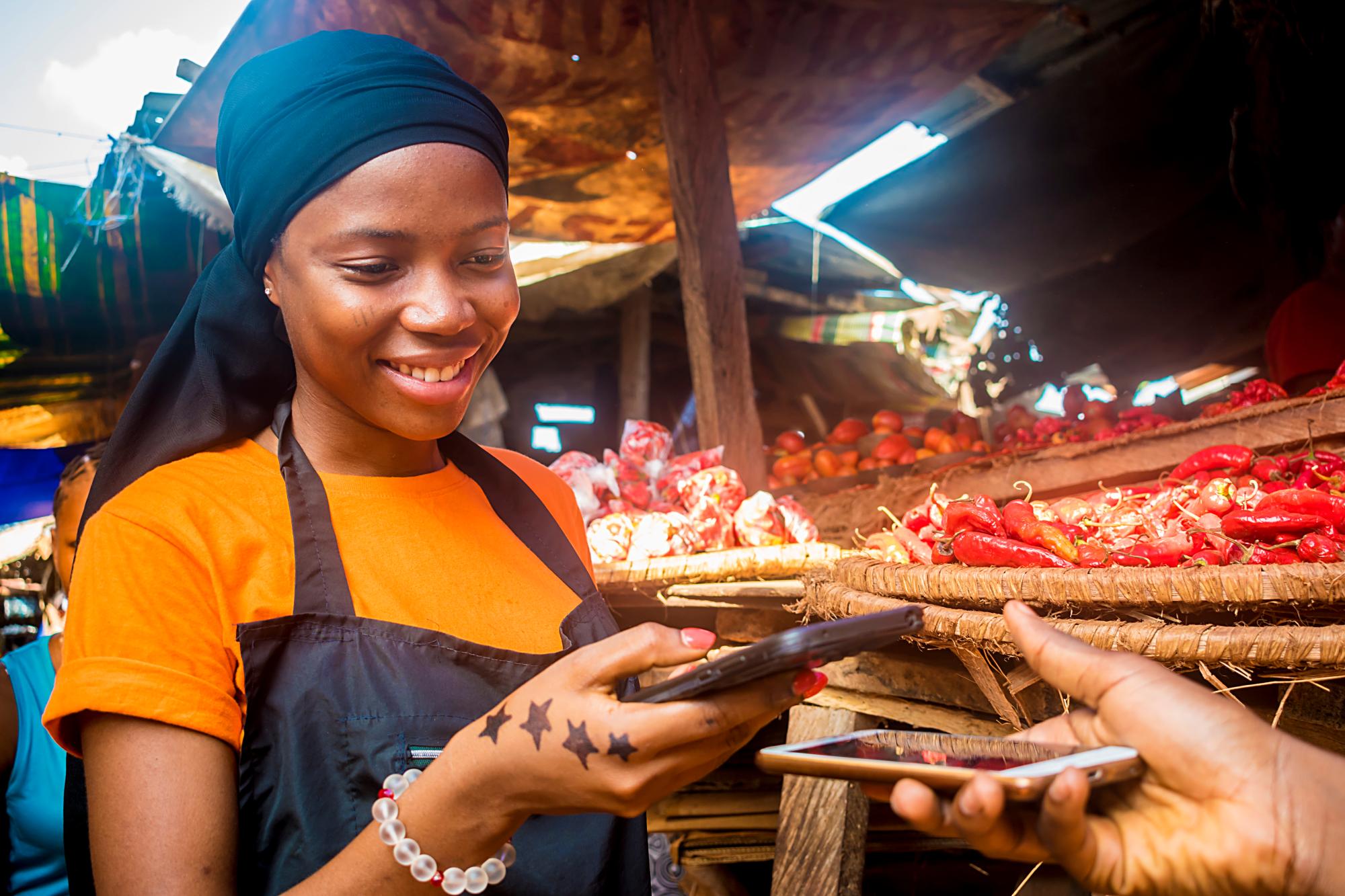 Woman making digital financial service transaction
