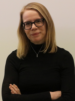 A headshot of a woman