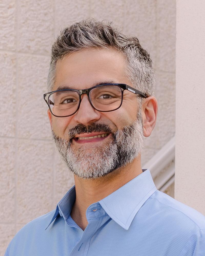 A headshot of a man