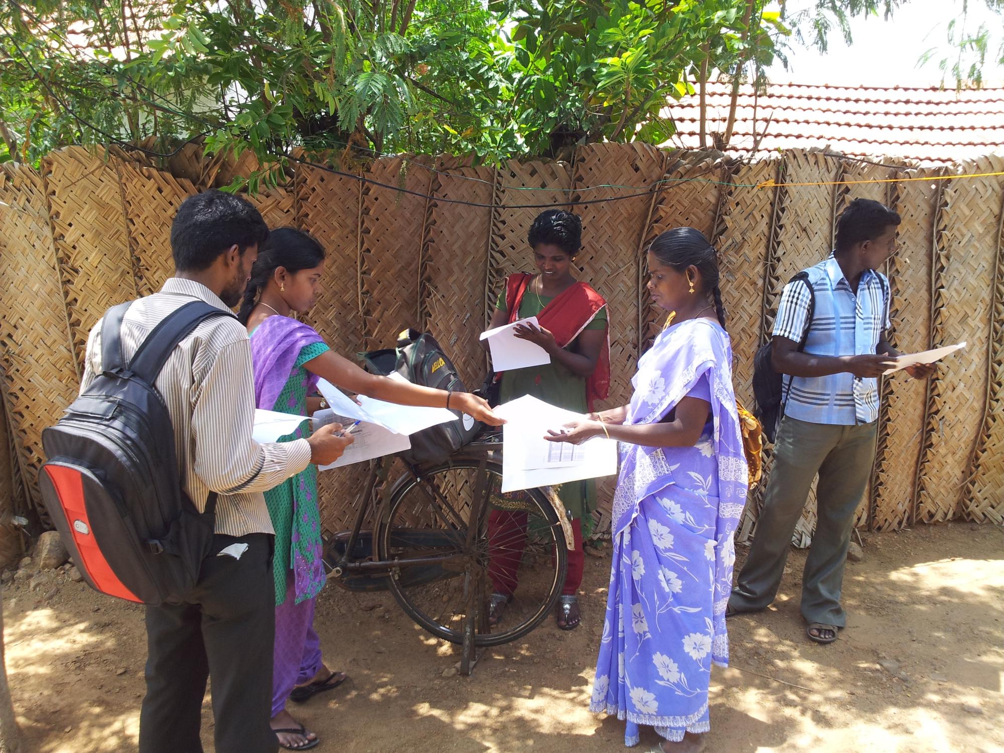 Kohlipura village, India. GOTN: The survey team debriefing after a long day of work.