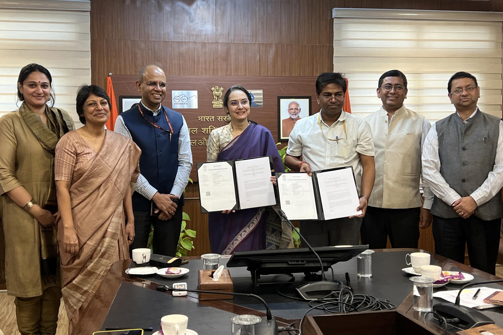 Officials from the Department of Drinking Water and Sanitation and J-PAL South Asia sign a partnership agreement to improve clean water access in India.