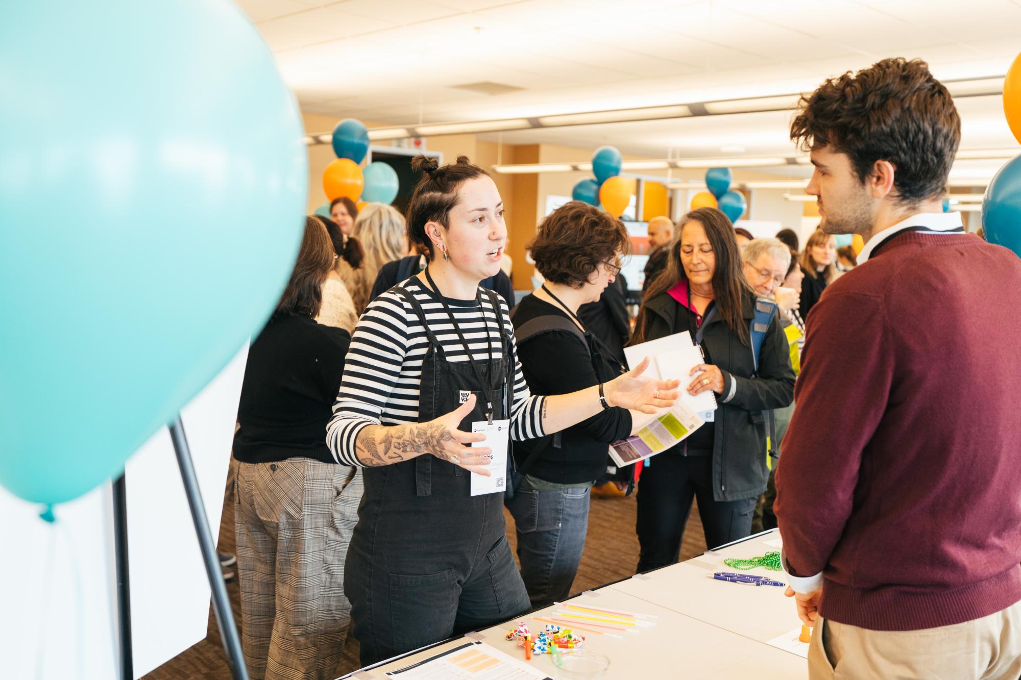 Two people talking to each other in the convening