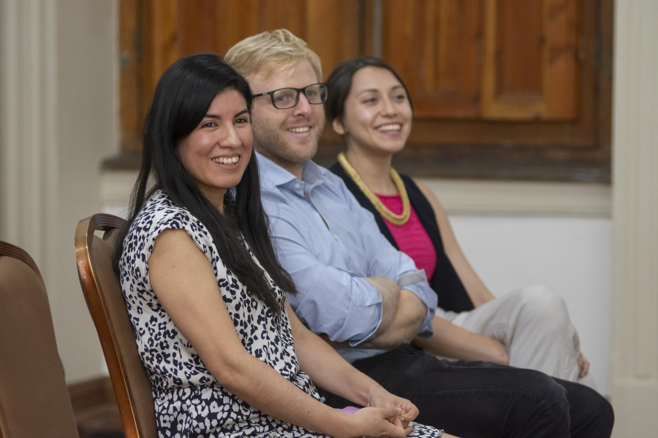 Three people sitting