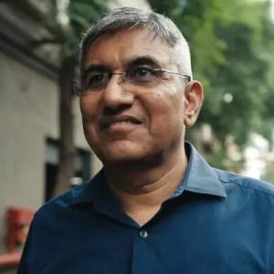 Headshot of Shri Devang Thanker