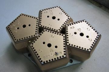 The four-panel offset die that was provided to Tech-Drop firms.