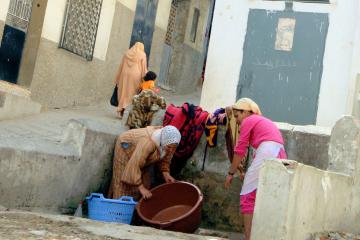 Women do laundry
