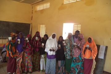 Girls in line to receive their scholarships in rural Niger