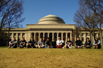 Students in the first cohort of MIT's new Master's in Data, Economics, and Development Policy pose in front of the Great Dome in January.