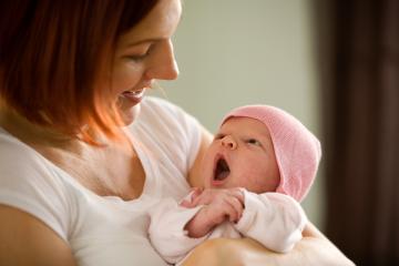 Mother holding baby 