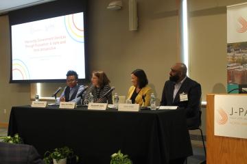 From left to right: Kim Desmond, Mary Ann Bates, Elizabeth Linos, and Stan John in panel discussion