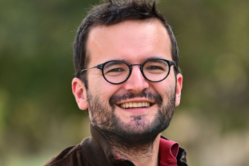 A headshot of a man