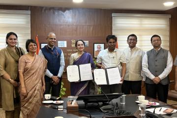 Officials from the Department of Drinking Water and Sanitation and J-PAL South Asia sign a partnership agreement to improve clean water access in India.