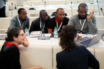 Invitees engage in discussion during a session of the 2025 UJALA Customized Training Program.