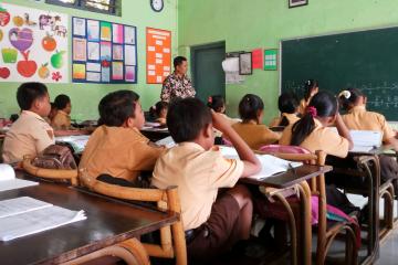 Children in a classroom in Indonesia.