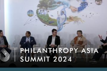 Iqbal Dhaliwal speaking with other panelists at the Philanthropy Asia Summit 2024