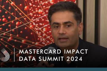 Iqbal Dhaliwal speaking at Mastercard Impact Summit