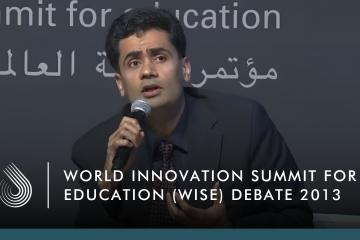 Iqbal Dhaliwal speaking at the WISE debate